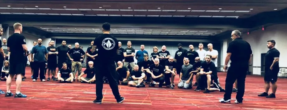Coach teaching the SPEAR self-defense system